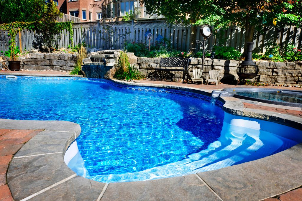 Custom pool and patio design, inspiration for Gretna backyards