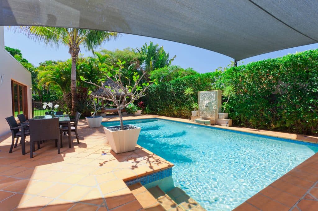Remodeled pool with upgraded finishes by Big Easy Pool Designs