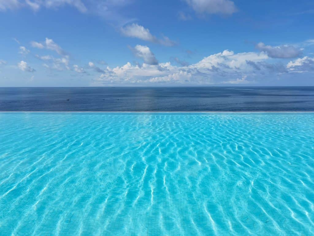 Infinity pool edge that seems to meet the horizon, the effect a vanishing edge creates on a Covington lot
